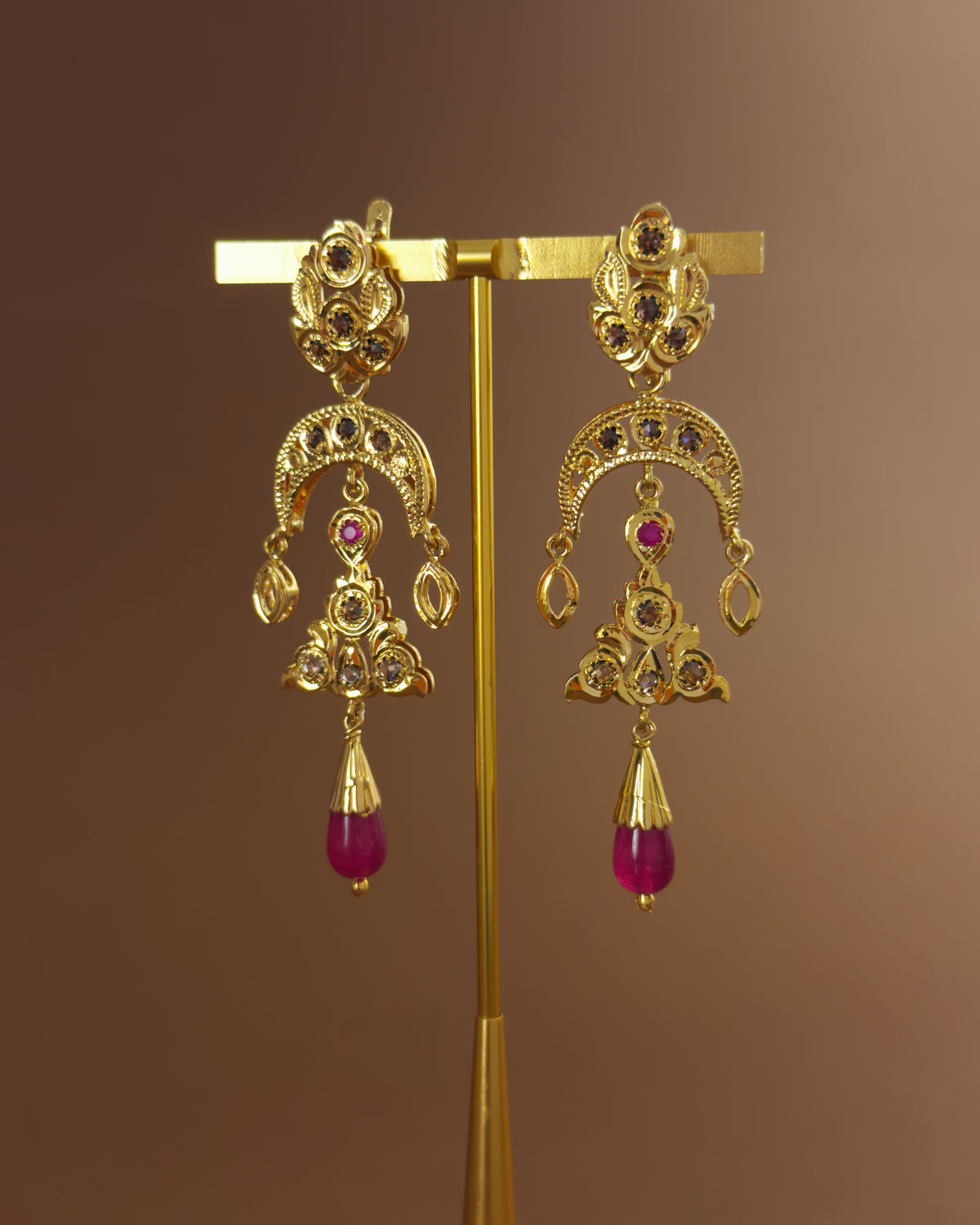 Pair of handcrafted Moroccan gold-plated sterling silver earrings with rosettes and red cabochons