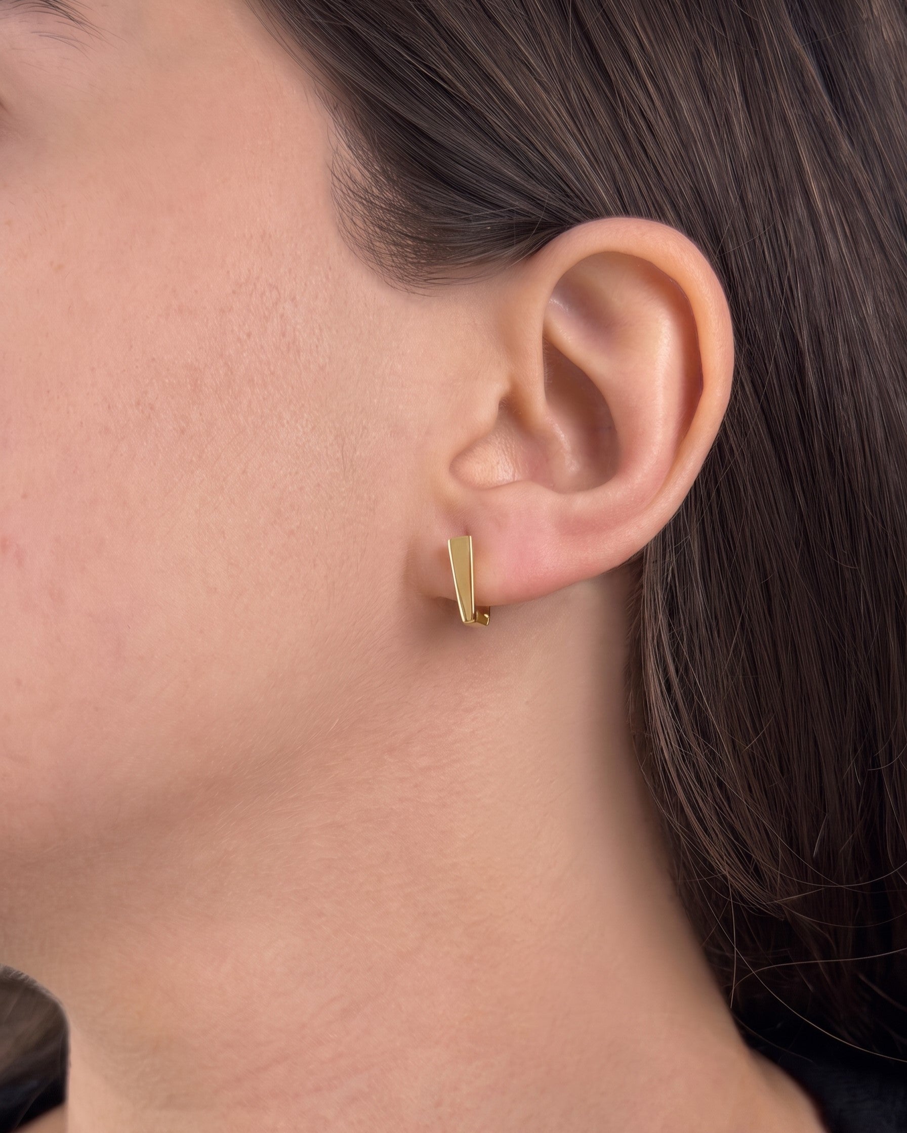 Gold vermeil hoop earring worn without the moon charm, showing the convertible two-in-one design for a minimalist look.
